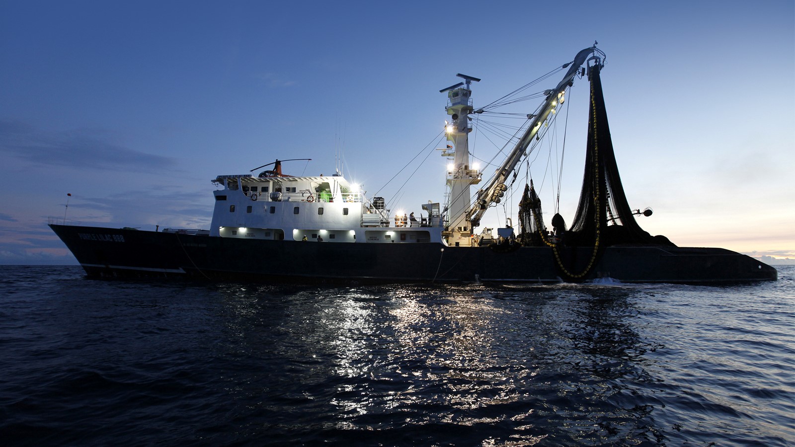 Purse Seiner Hauling In Net While Fishing For Salmon High-Res Stock Photo -  Getty Images